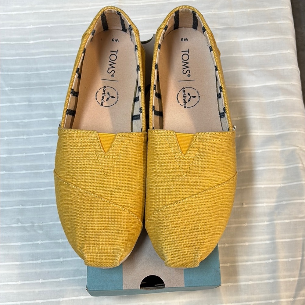 TOMS Yellow Slip-On Shoes